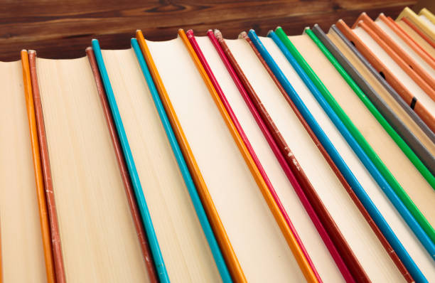 istock Stack of books on a wooden background.Education. - Image 1155161607