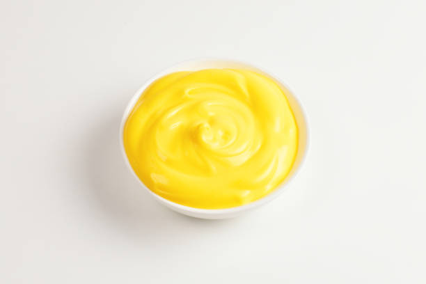 istock Cheese sauce in white plate on white background. 1155162631