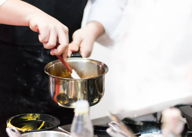 istock Chef cooking food in the kitchen, Chef preparing food 1155163762