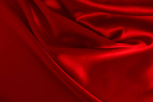 istock Red silk or satin luxury fabric texture can use as abstract background. Top view. 1155164035
