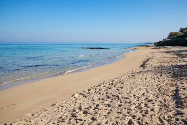 istock Sandy beach with transparent sea water. 1155167411