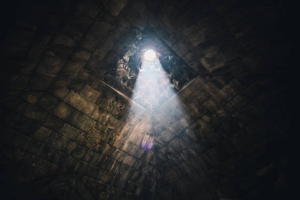 istock Ray of light falling through a dome of aged temple 1155168176
