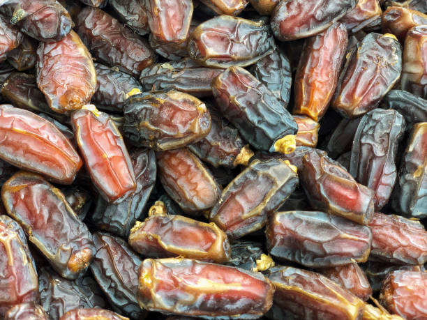 istock pile of date fruit as a background 1155169454