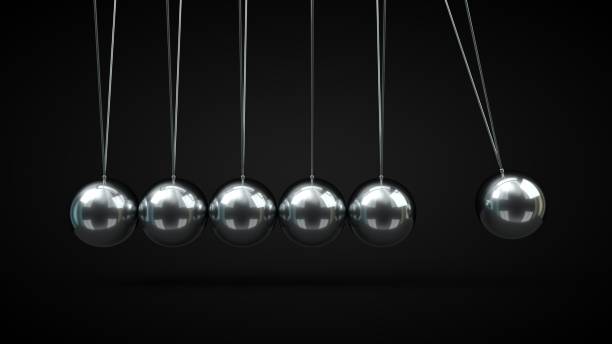 istock Newton's Cradle with silver balls. 3d illustration, on black backgorund 1155169805