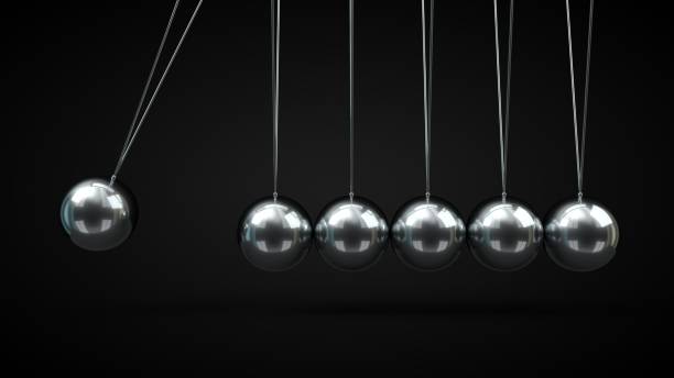 istock Newton's Cradle with silver balls. 3d illustration, on black backgorund 1155169930