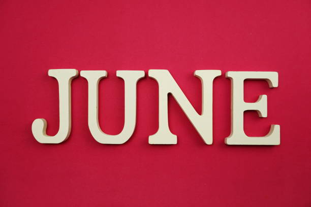 istock June alphabet letter with space copy on pink background 1155170685
