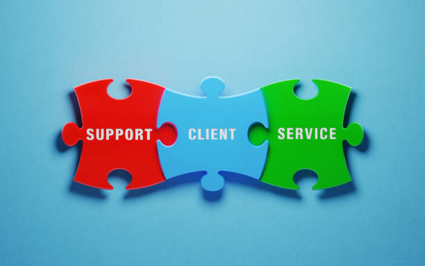 istock Customer Relationship Management Concept - Colorful Jigsaw Puzzle Pieces On Blue Background 1155172022