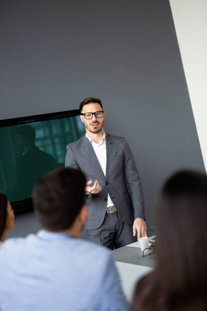 istock Business people working as a team at the office 1155172606