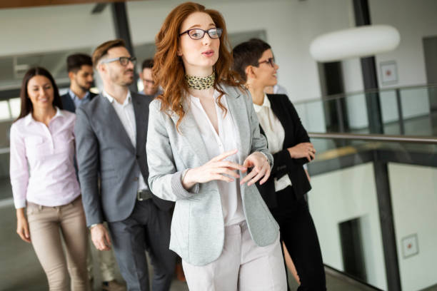 istock Group of business people collaborating in office 1155172918