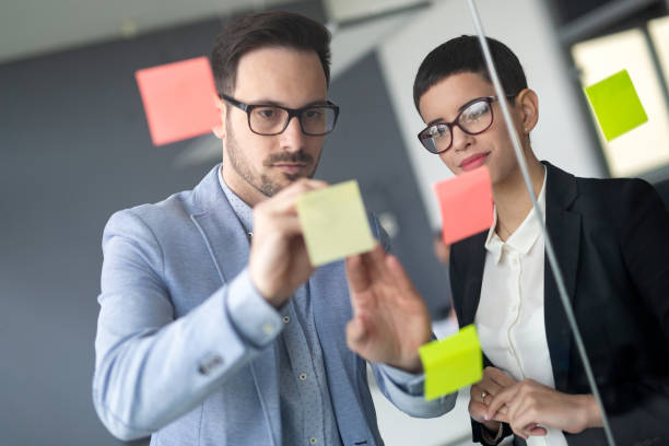 istock Collaboration and analysis by business people working in office 1155172954