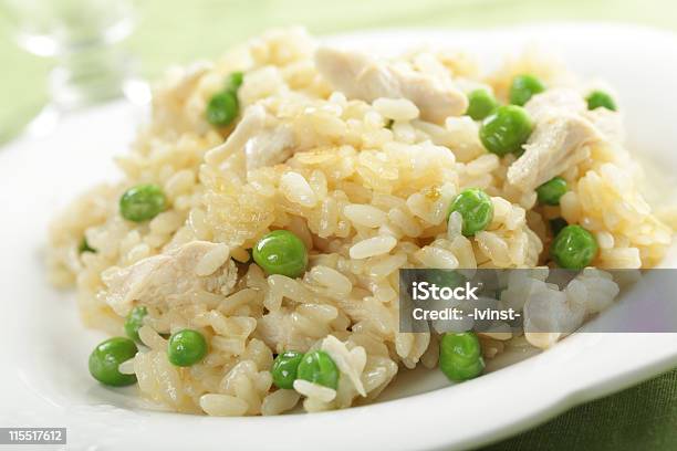 Chicken Risotto Stock Photo - Download Image Now - Chicken Meat, Green Pea, Risotto