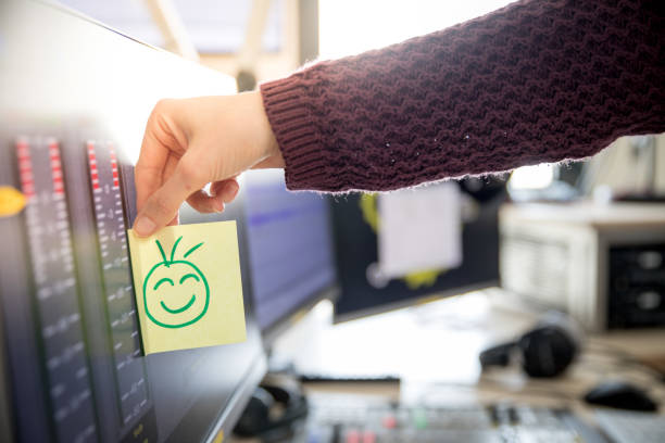 Feedback and motivation concept: Smiley Illustration at the working place