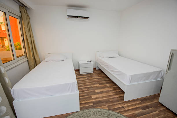 Twin beds in a luxury apartment