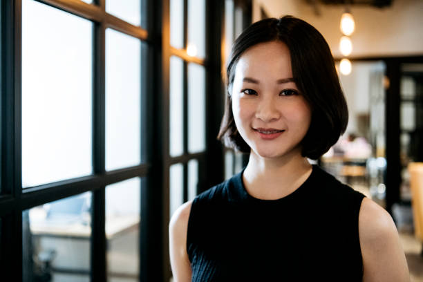 Professional woman with bobbed hair smiling