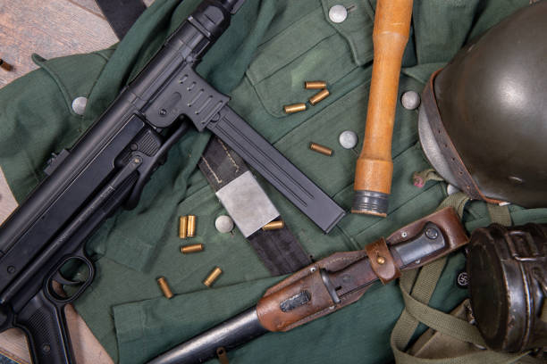 istock the ww2 german army field equipment with jacket, helmet and machine gun 1155183667