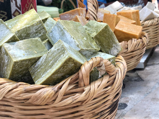 istock Hand made natural soap bars in basket 1155184110