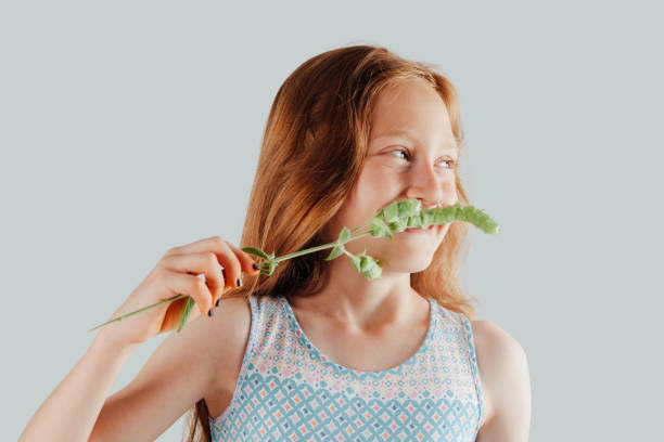 istock Beautiful Children Smelling Sage 1155184843