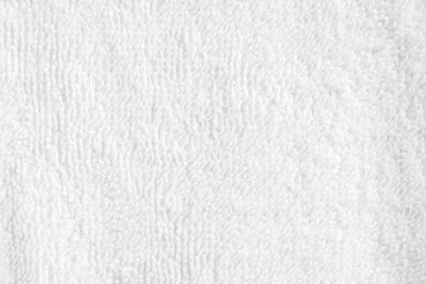 istock Closeup white blank fluffy terry towel texture background. 1155193078