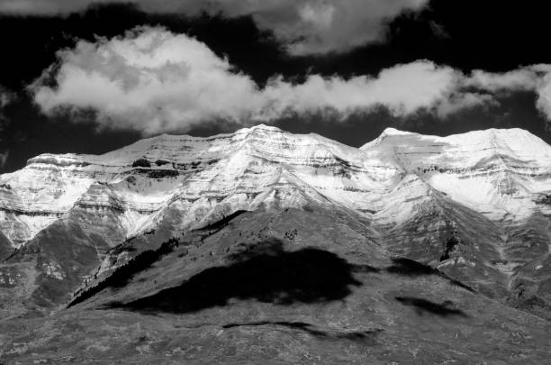 Ogden and mountains in Salt Lake City, Utah with snow during the fall captured in black and white Ogden and mountains in Salt Lake City, Utah with snow during the fall captured in black and white ogden utah photos stock pictures, royalty-free photos & images