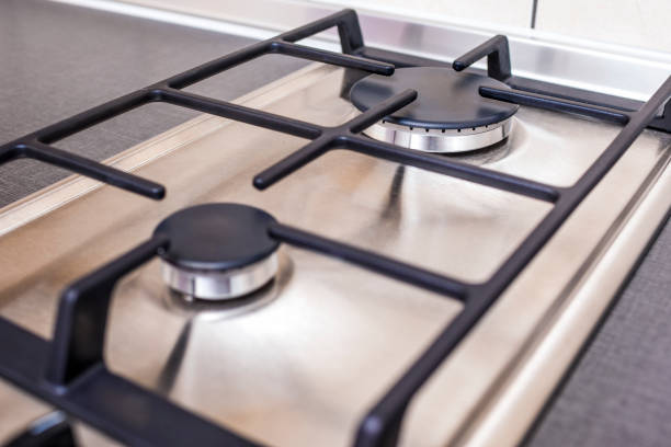 istock Closeup of Modern Double Burners Split Gas Oven. 1155199399