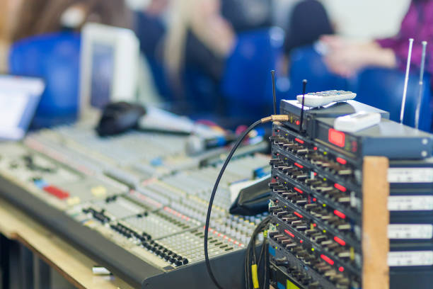 istock Closeup of a Professional Mixing Console At Work. 1155199406