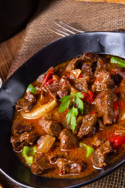 istock classic beef goulash with peppers and onions 1155199935