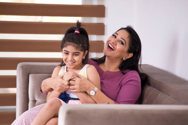 istock Mother playing with daughter at home 1155201556