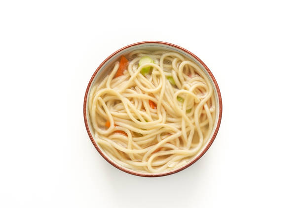 istock Chinese noodle or udon with vegetables and chopstick on isolated white background 1155201826
