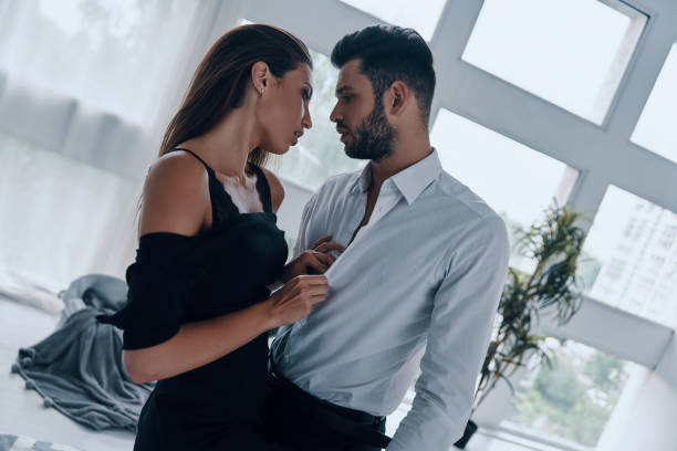 istock Young and playful couple. 1155205847