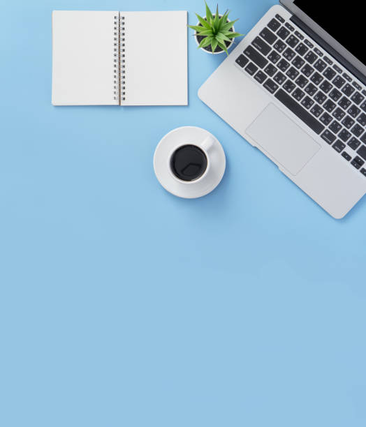 istock Business concept, relaxation in working time, drinking coffee taking a break on clean light blue office table, copy space, flat lay, top view, mockup 1155206005
