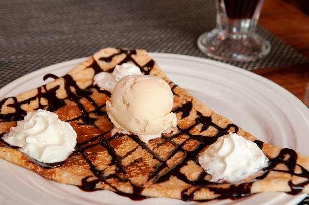 istock French simple pastry warm crepe with cold vanilla ice cream 1155206357