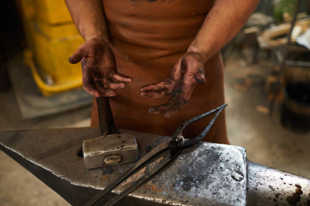 istock Dirty hands of blacksmith 1155206382