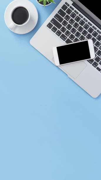 istock Business concept, relaxation in working time, drinking coffee taking a break on clean light blue office table, copy space, flat lay, top view, mockup 1155206604