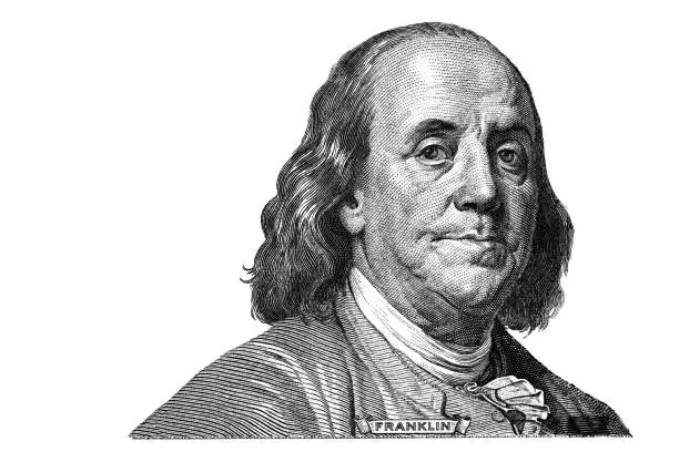 Photo of Benjamin Franklin cut on new 100 dollars banknote isolated on white background