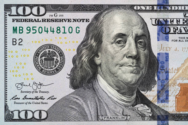 istock fragment of 100 dollar bill 1155207831