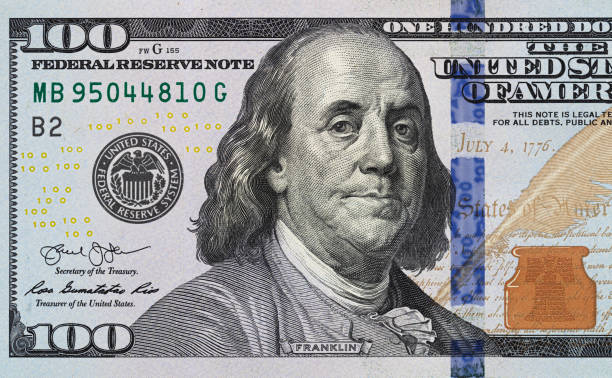 istock fragment of 100 dollar bill 1155208380