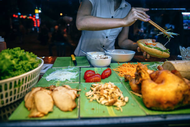 istock Street Food Vendor Making a Sandwich 1155208418