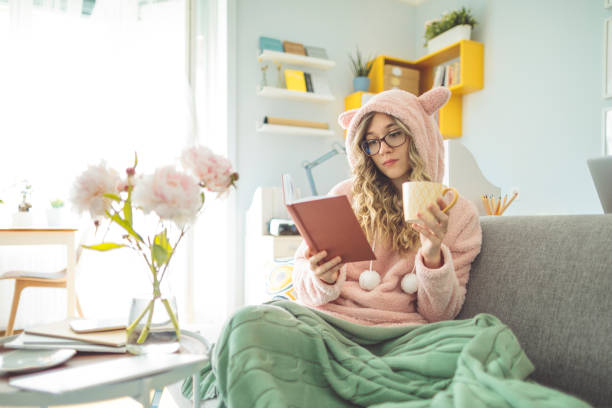 istock Young woman at home 1155208510