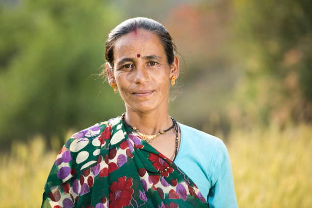 istock Indian woman at agricultural field 1155209986