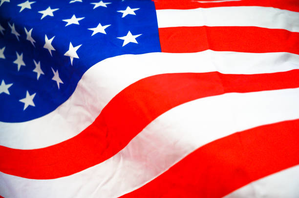 istock America flag waving with the wind for memorial day. 1155210146