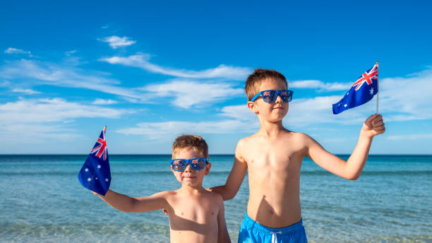 Kids holding Australian flags on Australia day