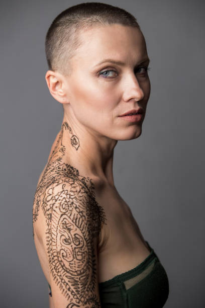 istock Skinhead woman portrait 1155210845