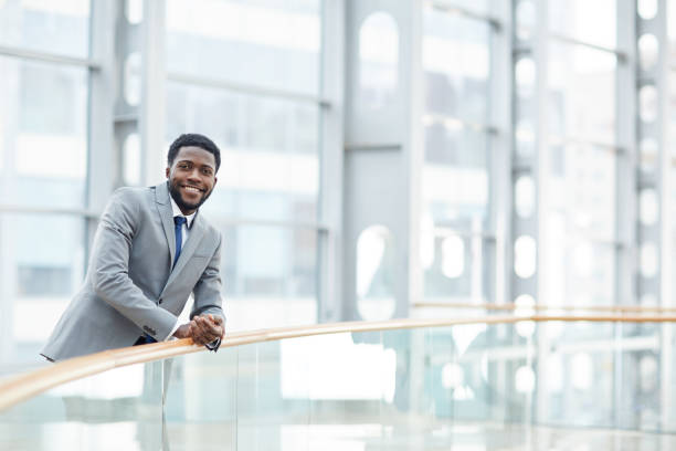 istock Dedicated businessman in gray suit 1155210977