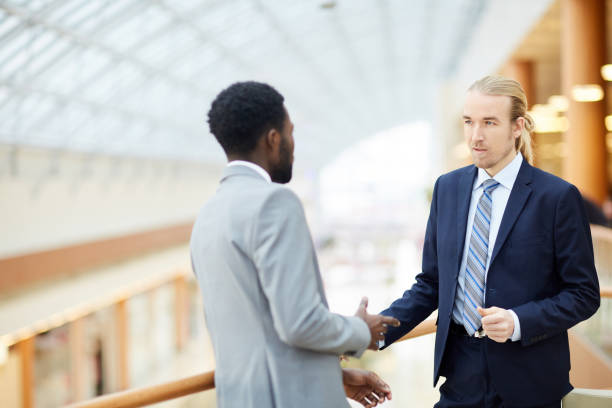 istock Discussing further collaboration 1155211750