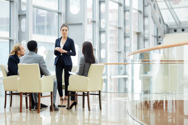 istock Lady offering business plan 1155211876