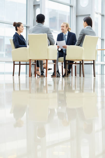 istock Discussing agenda at meeting 1155211933