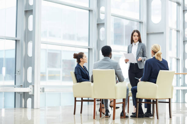 istock Business analyst informing colleagues about statistics 1155211947