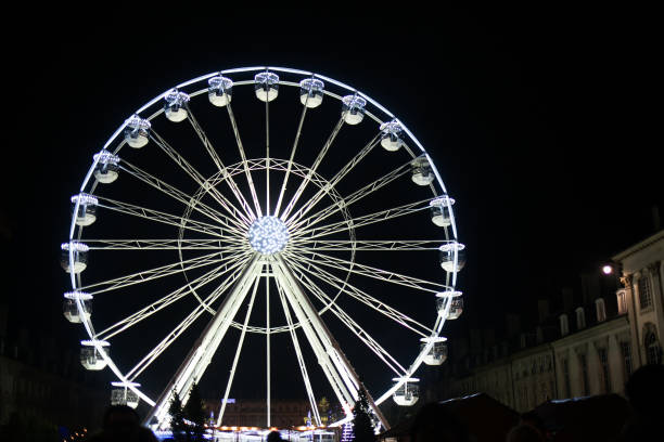 istock Ferris wheel at the night. Bright and futuristic. 1155212324