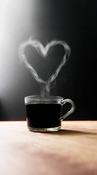 istock Hot Coffee Cup With Steamy Love Heart Shape 1155212644