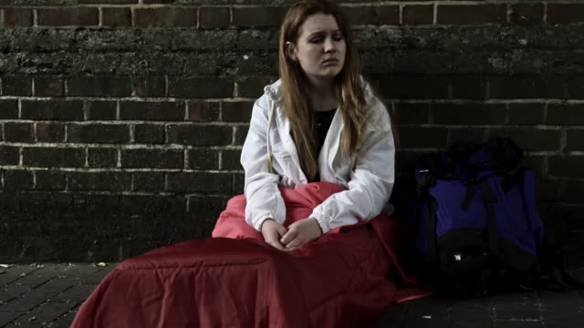 Vulnerable Homeless Teenage Girl Sleeping On The Street
